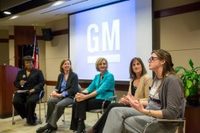 gm and women (select to view enlarged photo)